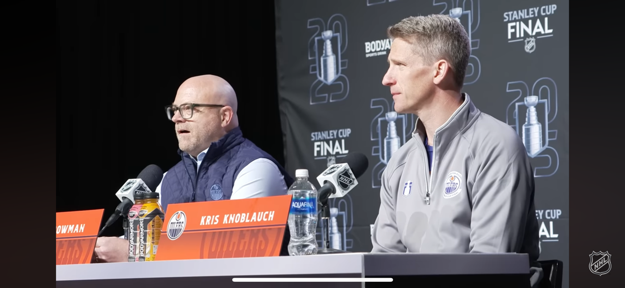 Kris Knoblauch and Stan Bowman at media day
